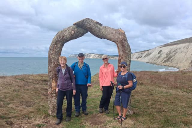 Four members of the Brighouse Friends of Overgate Hospice have taken on an incredible walking challenge around the Isle of Wight.