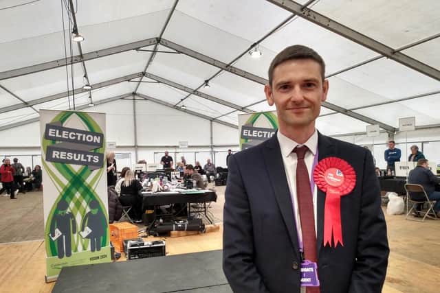 Coun Adam Wilkinson.