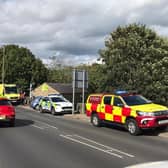 Emergency services vehicles at Elland Bridge yesterday