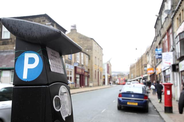 Calderdale Council's extension of on street parking charges and other car parking changes around the district will be reviewed later this year
