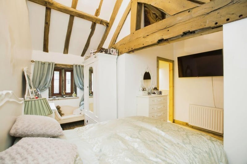One of five charming bedrooms in the property.
