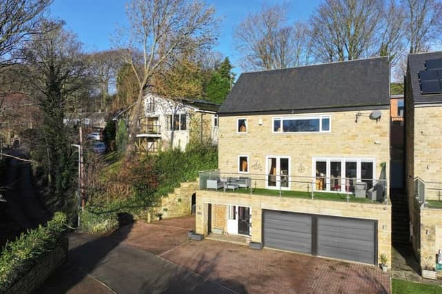 The front aspect of the property for sale in Greetland, with a balcony terrace.
