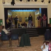 The cast, chorus and crew  of Rastrick’s St John the Divine Pantomime Society rehearsing for last year's pantomime.