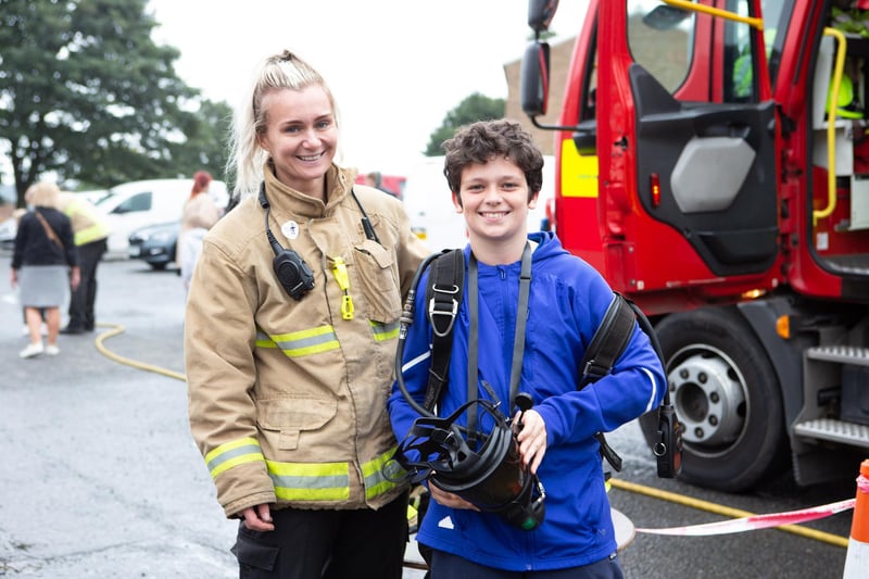 Firefighter Amy Joemagi with Tomas Kababe at Halifax Fire Station open day