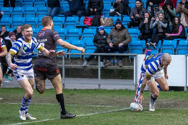 The celbrations begin as debutant Jake Maizen goes over to ensure Fax start the season with a win at home to Sheffield Eagles.
