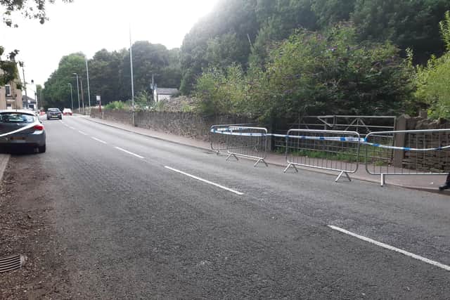 Two sections either side of Elland Road near Brighouse have been taped off by police