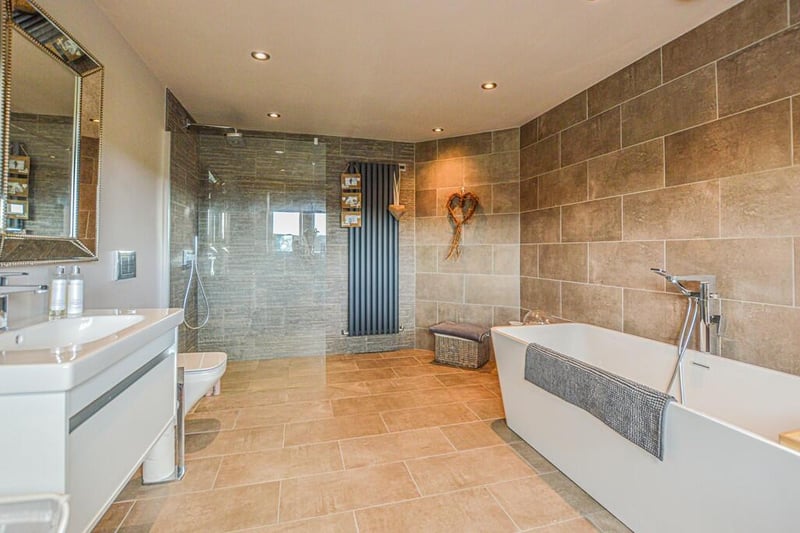 A bath and shower room within the property.