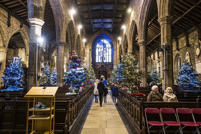 The Halifax Minster Christmas Tree festival welcomes visitors every year.