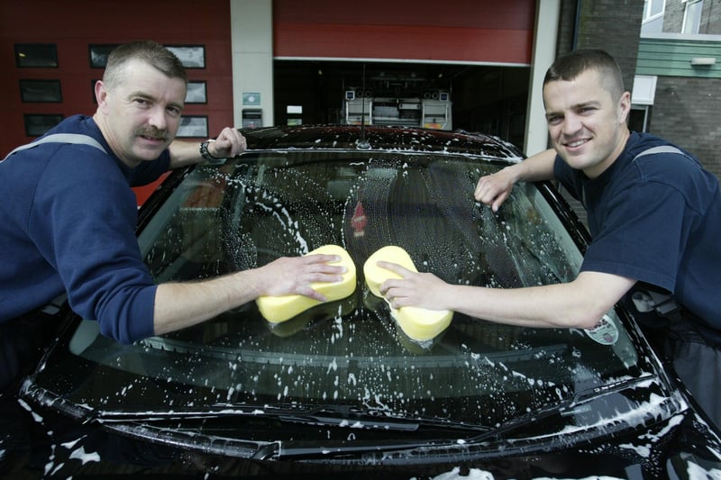 Brighouse firefighters washing cars for the Fire Service National Benevolent Fund back in May 2005
