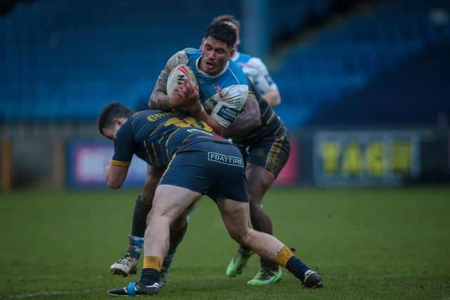 Adam Tangata is tackled by the Whitehaven defence