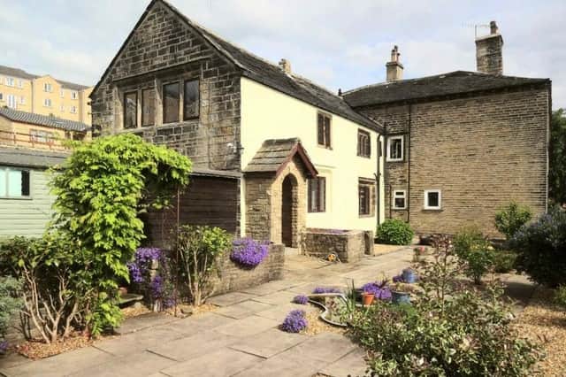 The attractive exterior of the five-bedroom property.