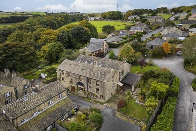 This property is on the market for offers in the region of £1,200,000 with Charnock Bates. Dating back to the 1600s, the property benefits from period features throughout including exposed beams, open roof trusses and arched windows.