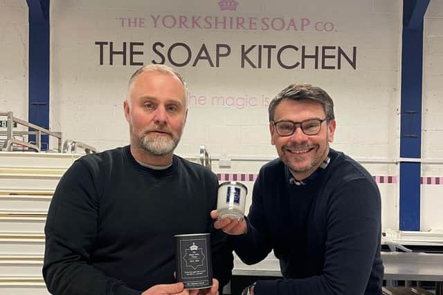 Marcus Doyle (left) and Warren Booth (right) with the Happy Valley candle created by The Yorkshire Soap Company
