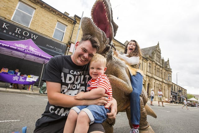 Jack Malone, two, and dad Luke Malone with Tony the T-Rex and Ranger Jessi.