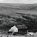 Flashback image showing Bell House farm, Cragg Vale (left) the former home of the Cragg Vale Coiners and Bell House Barn (right)