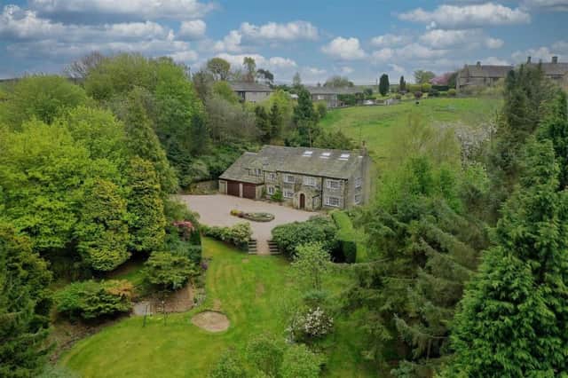 The property has manicured gardens and idyllic surroundings.