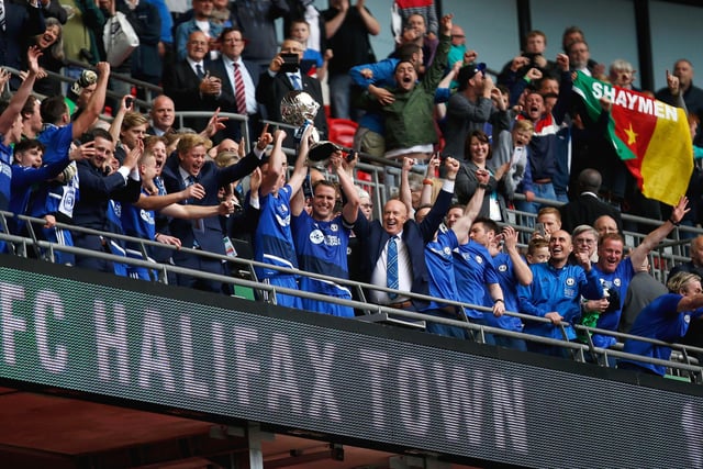 LONDON, ENGLAND - MAY 22:  Halifax Town captain Nicky Wroe lifts the FA Trophy after the FA Trophy Final match between Grimsby Town FC v FC Halifax Town at Wembley Stadium on May 22, 2016 in London, England.  (Photo by Joel Ford/Getty Images)