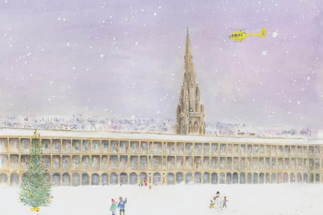 An artist has included the Piece Hall in Halifax in a series of iconic Yorkshire landscape Christmas cards