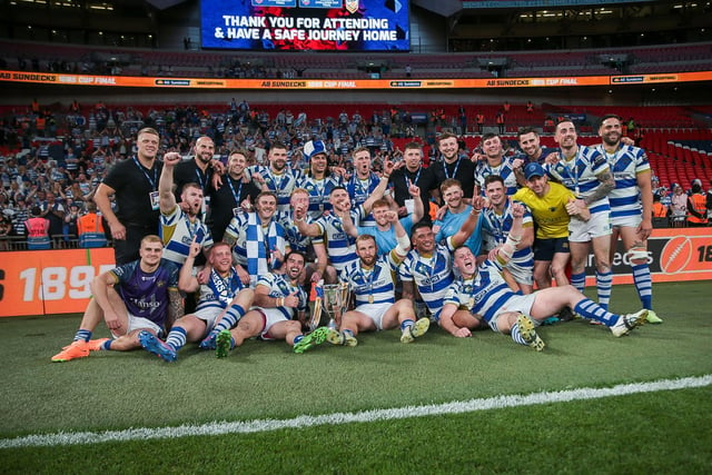 Halifax Panthers celebrate with their fans after lifting the 1895 Cup at Wembley
