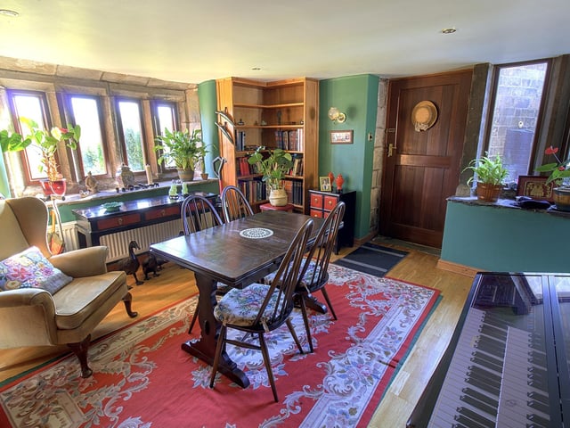 A good sized dining room that could be of flexible use.