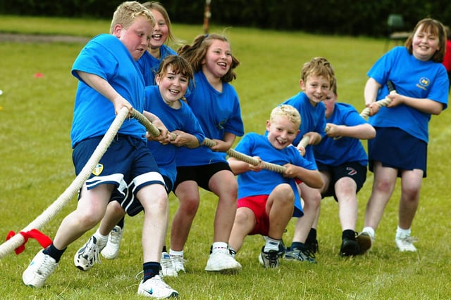 Children take part in the tug-o-war at the Shelf Junior and Infant School sports day in 2010