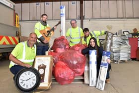 Members of Together Housing’s Clear and Clean team with items saved from waste disposal.