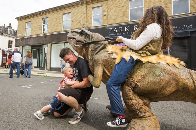 Jack Malone, two, and dad Luke Malone with Tony the T-Rex and Ranger Jessi.