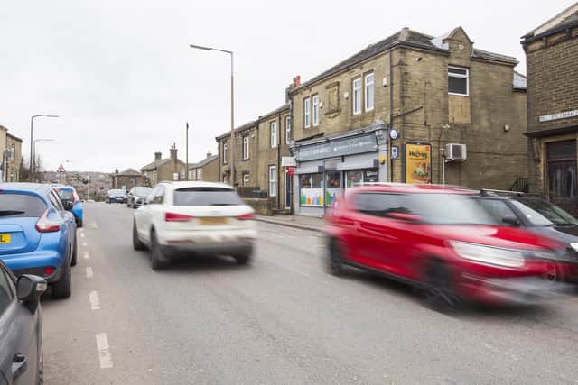 Traffic by Patchett's Mini Market, on the A647 at Ford Hill, Queensbury. Councillor Hazel Johnson (Lab, Queensbury) said residents wanted a measure like a traffic island installed to make it safer for pedestrians to cross the road.