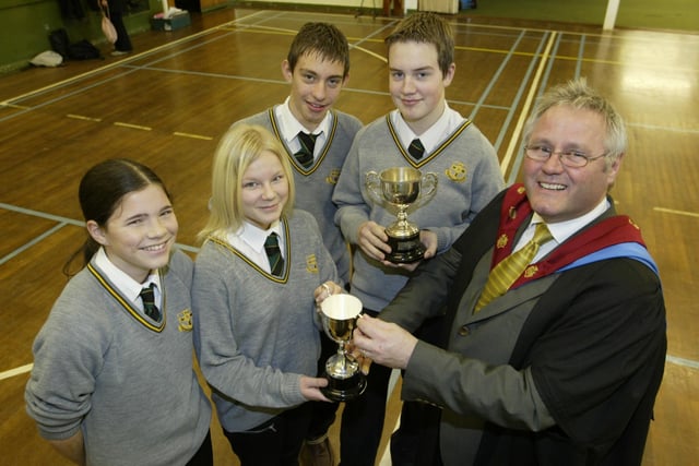 Pictured before the start of the school prizegiving at Holy Trinity school, Holmfield are prize winners with headmaster Philip Williamson back in 2004.