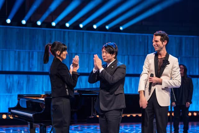 Lang Lang and Mika stood opposite Claudia on stage at Royal Festival Hall. Picture: Mark Bourdillon/Love Productions