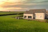 This property is on the market for offers over £895,000.