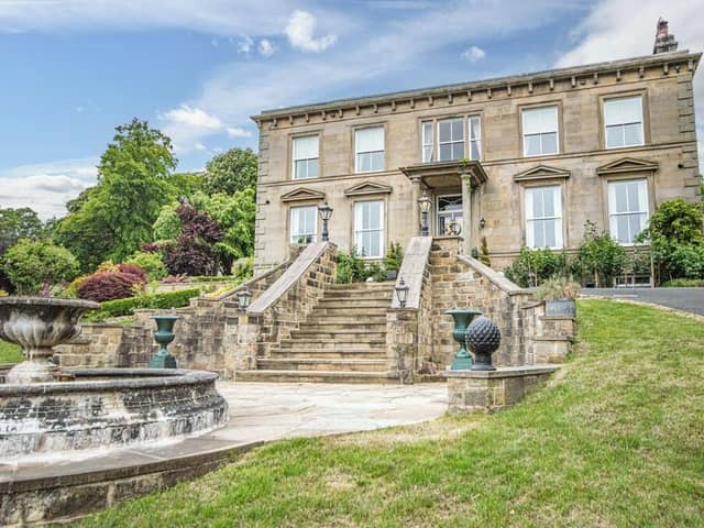 Outside the property has numerous grand features, including the stone pillared portico entrance, wide stone staircase which leads down to the water feature turning circle.