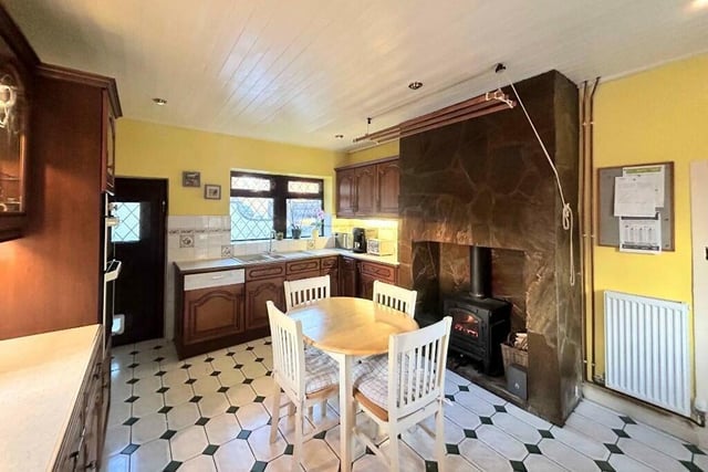 The dining kitchen has a warming stove to ramp up the cosy factor.