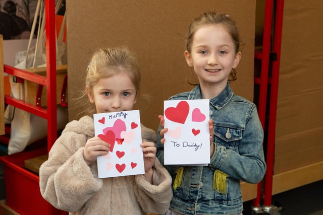 Valentine's Day card marking and crafts event at The Piece Hall, Halifax. Pictured are Mya and Lily Hardcastle