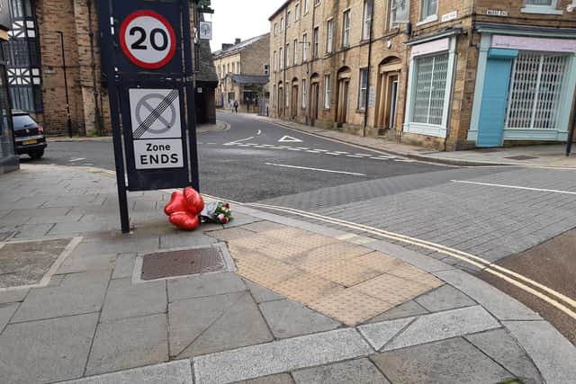 Flowers and balloons left for one of the victims of the stabbing in Halifax town centre