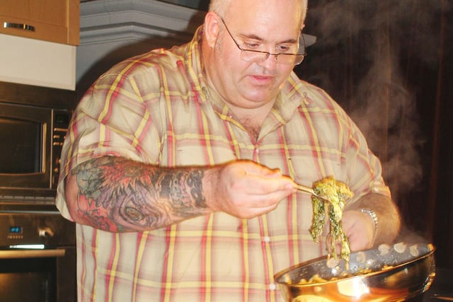 Chef Martin Hutton carries out a cookery demonstration.