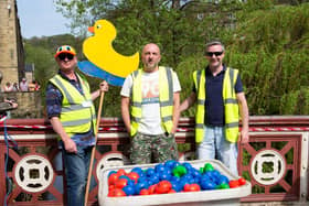 Peter Lord, Dave Freeth and Richard Halliwell, official duck throwers, at a previous duck race