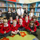 Heptonstall Junior and Infant School has received a 'Good' Ofsted report. Headteacher David Perrin with pupils.
