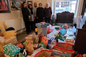 Sowerby Bridge Together volunteers with some of the gifts bought for youngsters