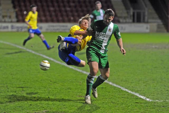 Simon Ainge, pictured in action for Bradford Park Avenue,  in 2015. His football career also saw spells with Halifax, Bradford City and Harrogate Town.