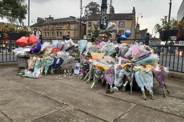 Floral tributes left two the two young men who died