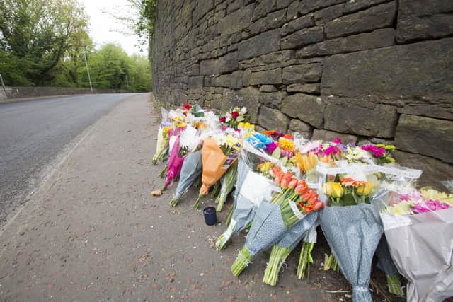 Flowers left in tribute to Felix Jackson after the crash on Burnley Road