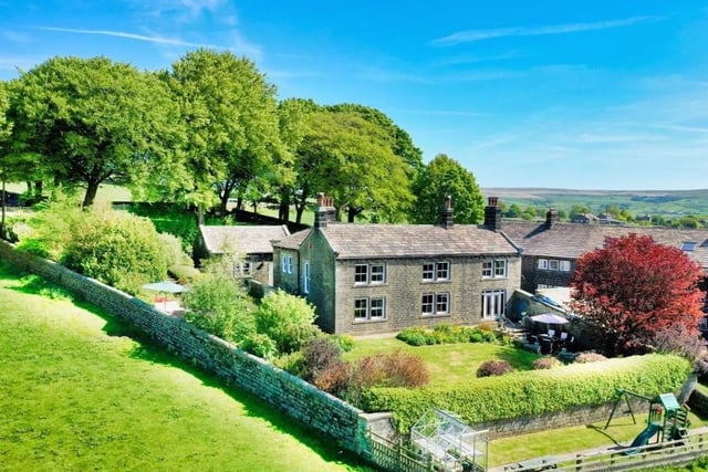 This property in Heptonstall is on the market with Charnock Bates for offers in excess of £1,000,000. This former four-bedroom mill owners house enjoys stunning far-reaching views across the neighbouring open countryside.