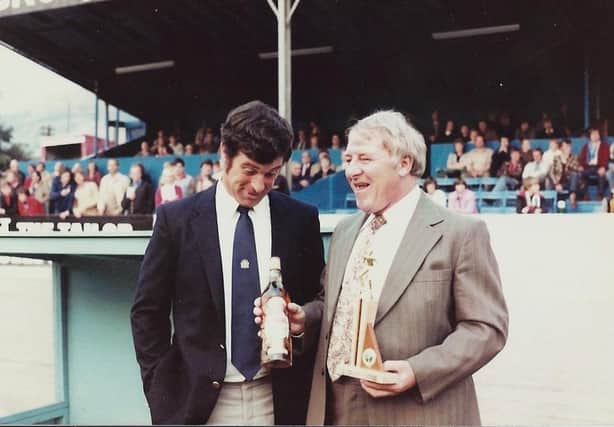 Mickey Bullock shares a joke with Tommy Docherty, September 1, 1981