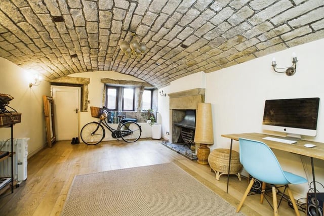 The house is steeped in history and is Grade II listed but it has modern fittings among the beamed ceilings and exposed stone walls and fireplaces.