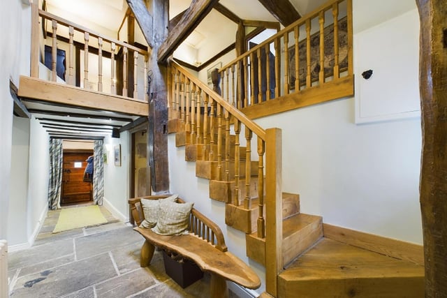 A beautiful oak staircase gives access to the first floor
