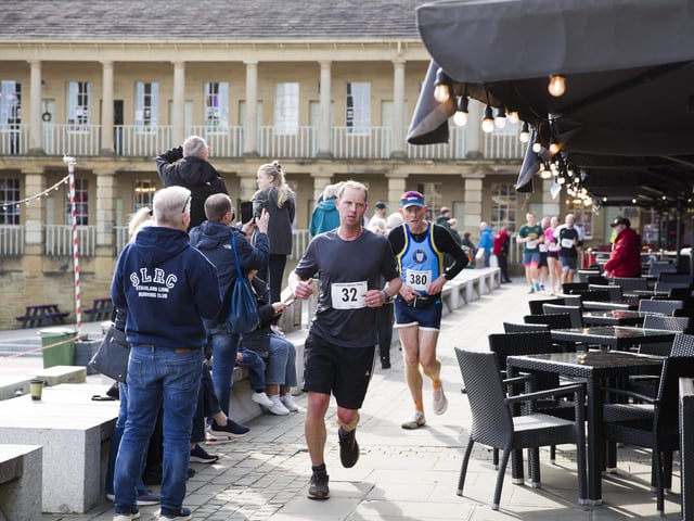 Halifax Urban Trail run through the town's iconic landmarks for Overgate Hospice. The Piece Hall