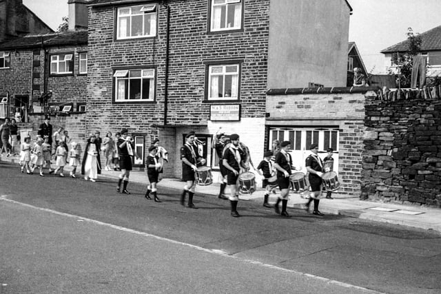 Many villages would have their own annual Charity Gala. Here the Northowram Charity Gala parade marches down Lydgate. 1966