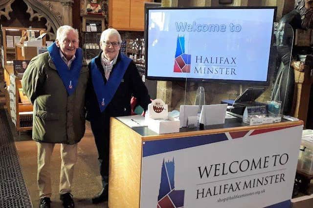 Two of the regular 'welcomer' volunteers at Halifax Minster