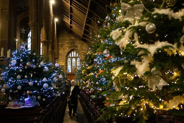 It’s beginning to look a lot like Christmas at Halifax Minster with people being able to wander through the Minster, illuminated by a forest of sparkling Christmas trees.